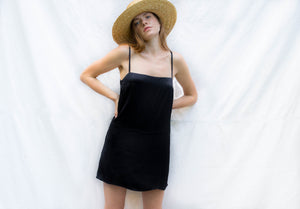 
                  
                    Square cut mini silk slip dress. Available in the color of natural silk and naturally dyed silk to a light brown.
                  
                
