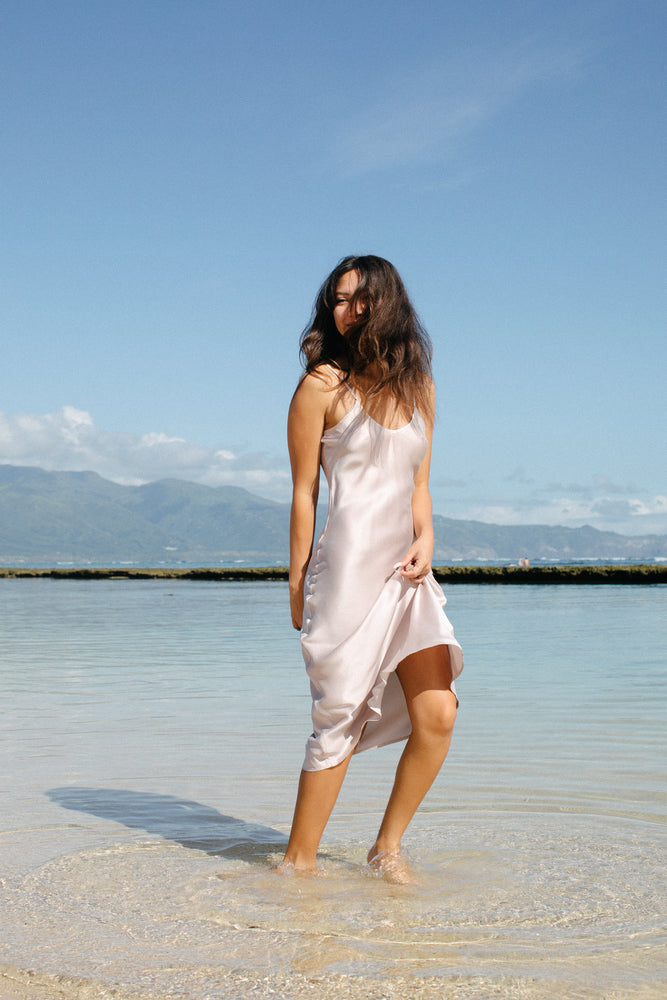 
                  
                    Natural mulberry silk midi slip dress. Untouched with dye to showcase the natural and pure color of mulberry silk.
                  
                